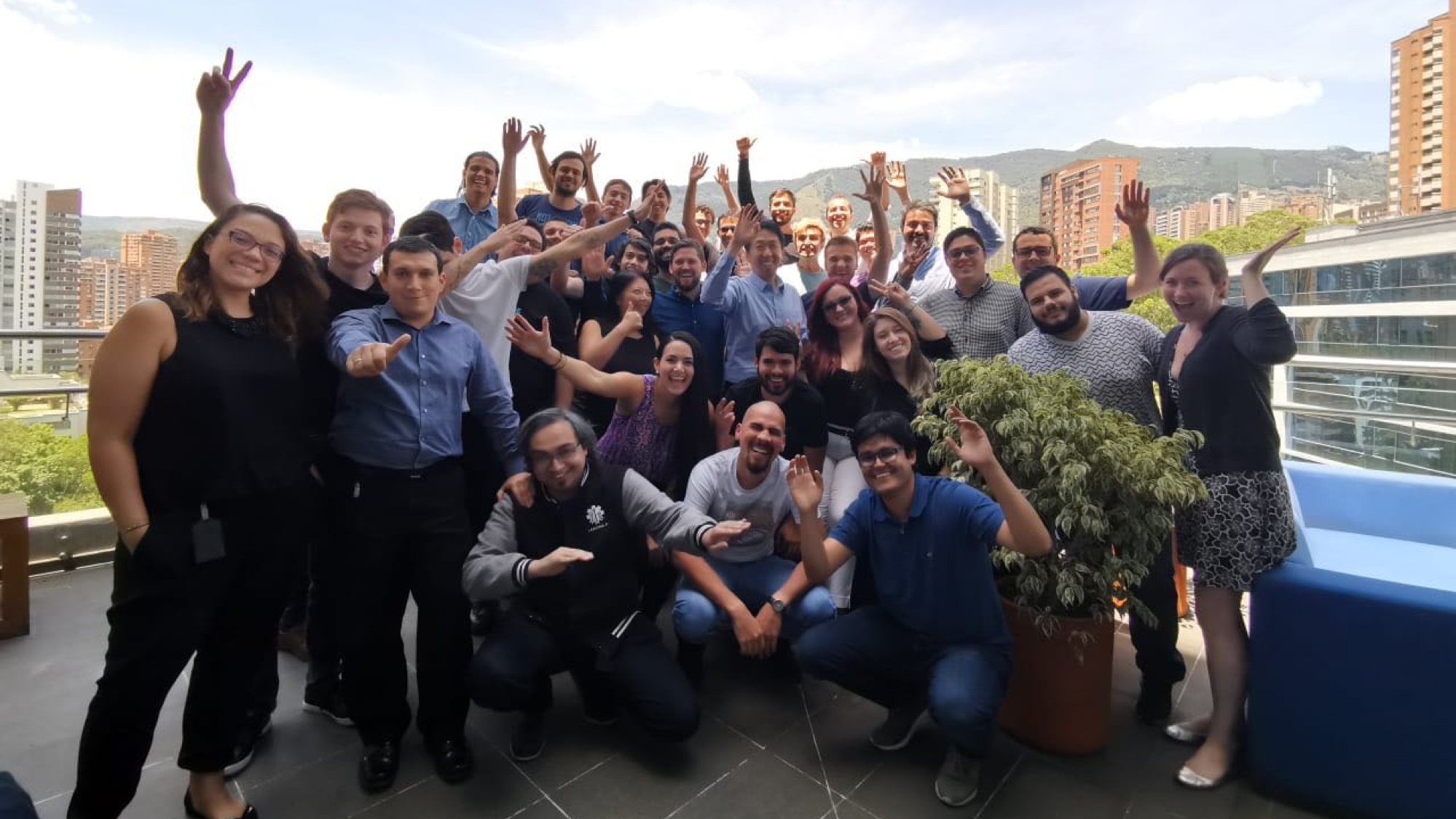 Andrew Ng with a group of engineers in Medellin, Colombia