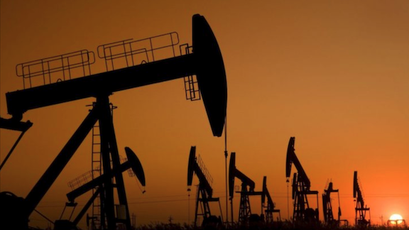 Pumpjacks extracting oil during sunset